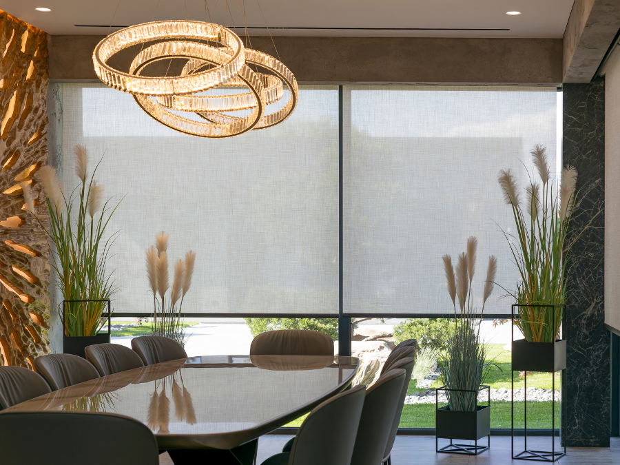 Motorised roller blind operating via remote control in a Perth home